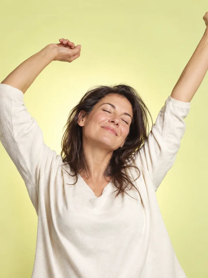 Woman stretching with morning energy