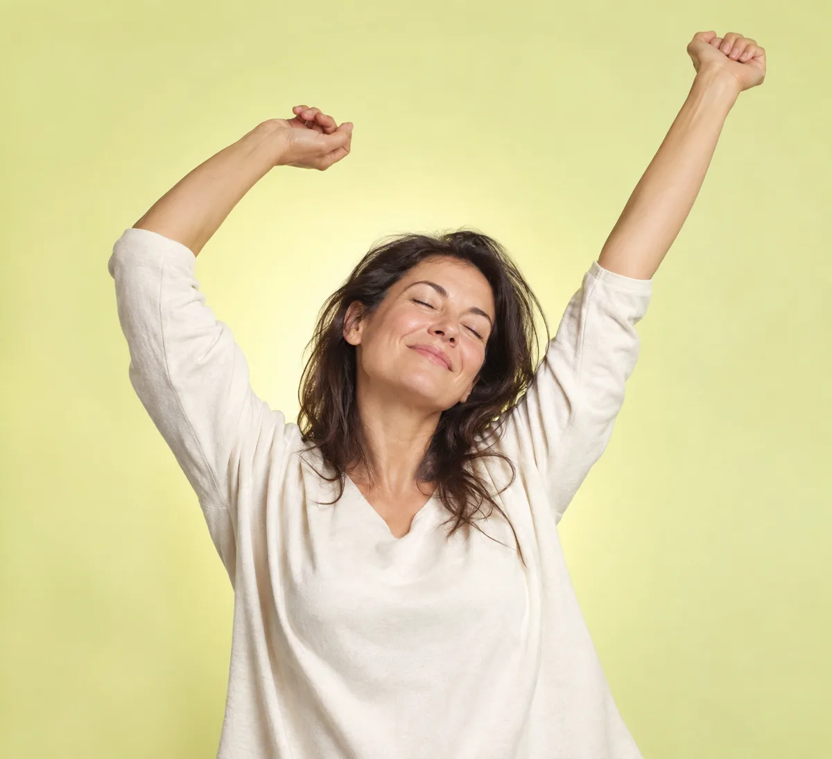 Woman stretching with morning energy
