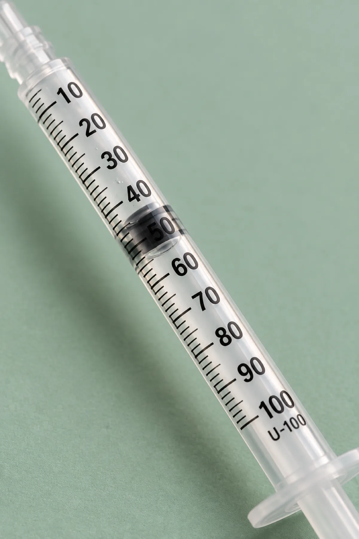 U-100 insulin syringe barrel with unit markings up close